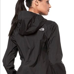 Women’s waterproof hooded North face rain jacket.